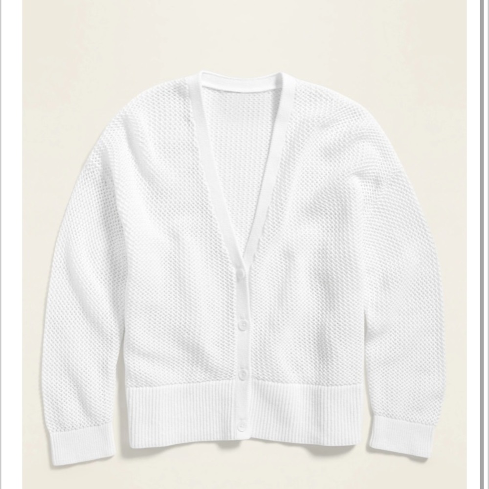 White sweater, never worn with tags.